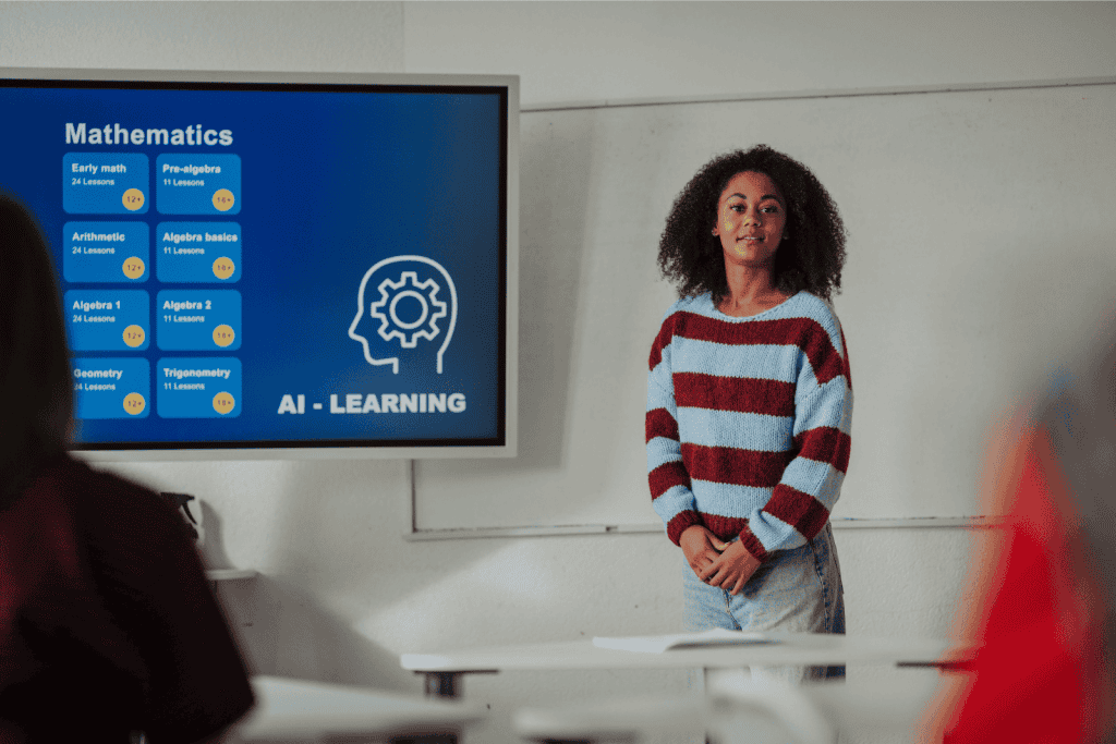 A high school teacher in front of a smartboard that projects a math lesson using AI